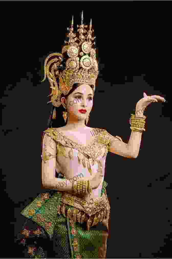 A Cambodian Woman Dressed In Traditional Apsara Dance Attire, Her Graceful Movements Captured By Photographer Rebecca Shaw. Asia Exotic Traditional PhotoBook Volume1: A Beauty Of South East Asia Woman In Different Countries Collection Photography By A Female Photographer From Thailand