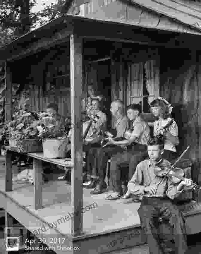 A Group Of Musicians Gathered On A Porch, Playing Traditional Instruments, Symbolizing The Roots Of Country Music In Rural America. The Great Of Country: Amazing Trivia Fun Facts The History Of Country Music