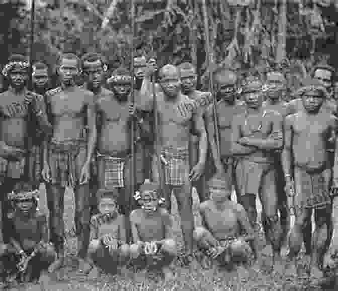 A Group Of Negrito Children Playing In A Rainforest Clearing. The Wind In The Bamboo: A Journey In Search Of Asia S Negrito Indigenous People