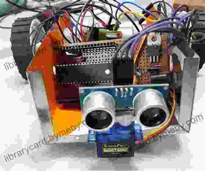 An Obstacle Avoiding Bot Made From A Microcontroller, A Few Sensors, And A Few Other Components Homemade Robots: 10 Simple Bots To Build With Stuff Around The House