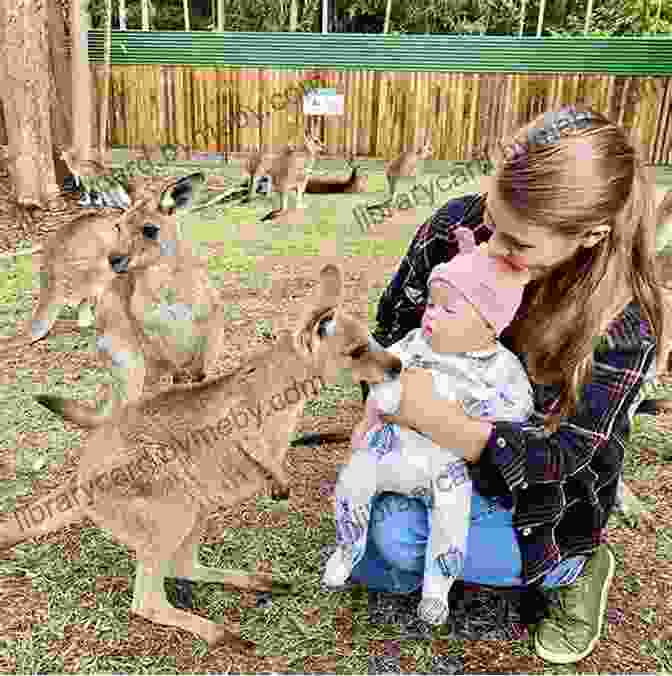 Bindi Irwin Holding A Baby Kangaroo Trouble At The Zoo: A Bindi Irwin Adventure (Bindi S Wildlife Adventures 1)