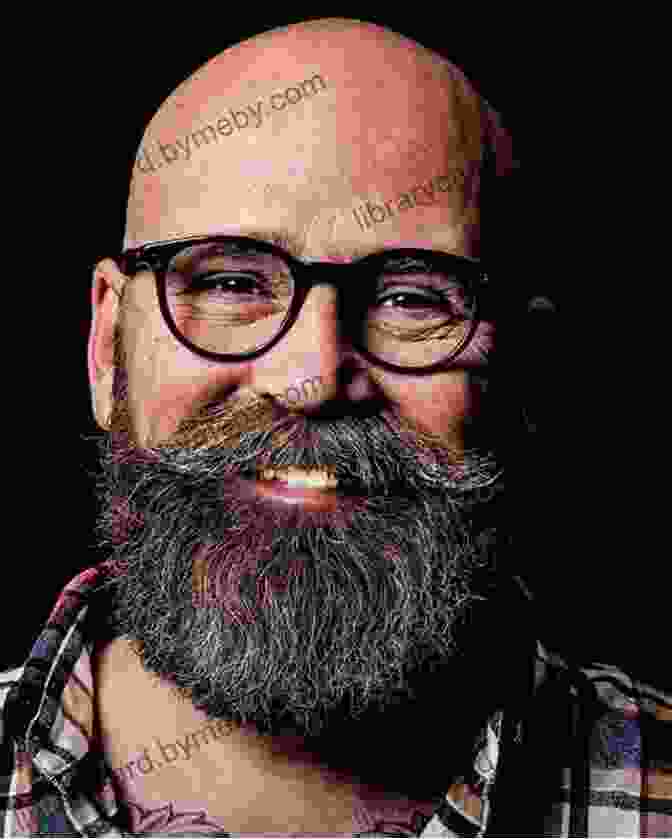 Rolf Potts, A Man With A Beard And Glasses, Smiling And Looking Into The Camera. I M Fearless Rolf Potts