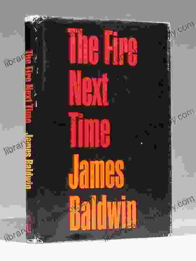 The Fire Next Time Book Cover Featuring A Striking Image Of A Burning Cross Against A Backdrop Of A Field And Sky The Fire Next Time (Vintage International)